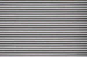 The texture of the shutter door or window in light gray color