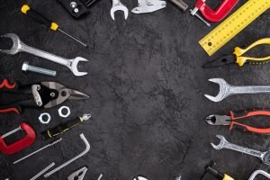 top-view-of-set-of-construction-tools-on-black-background
