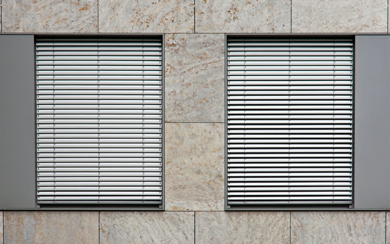 Two windows with shutters