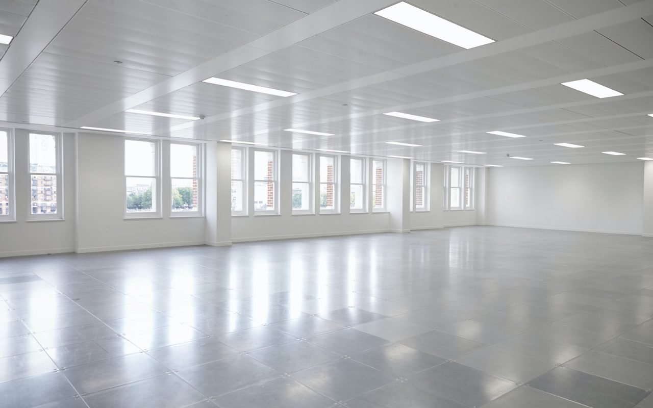 Vacant open plan office space with windows